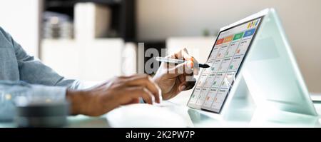 Kanban Project Management Software On Laptop Stock Photo