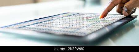 African American Spreadsheet Data Analyst Stock Photo
