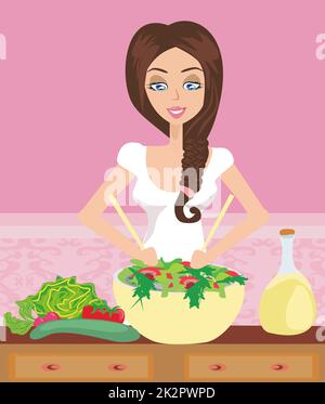 Woman healthy cooking with salad bowl in the kitchen Stock Photo