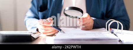 Fraud Investigation And Tax Audit. Investigator Or Auditor Stock Photo