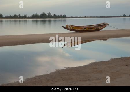 Fishing boat at sunset on the Senegal River. Stock Photo