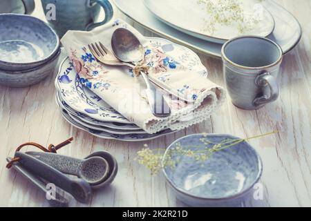 Sustainability concept - stoneware and kitchenware on wooden table Stock Photo