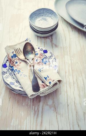 Sustainability concept - stoneware and kitchenware on wooden table Stock Photo