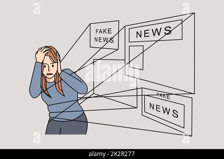 Woman under influence of fake news Stock Photo