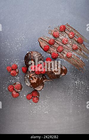 Save room for dessert. a delicious dessert consisting of raspberries and chocolate. Stock Photo