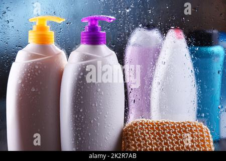 Different containers of body care products in the bathroom Stock Photo