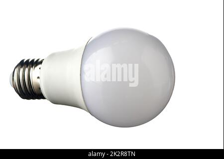 A white LED lamp with an E27 base lies on a white insulated background Stock Photo