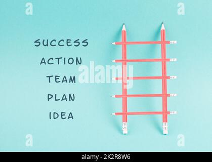 Ladder of success,having an idea, planning a strategy, teamwork for success step by step concept, progress in business and education, have a goal Stock Photo