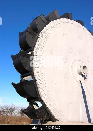 Brown coal mine construction and the paddle wheel of a bucket wheel excavator Stock Photo