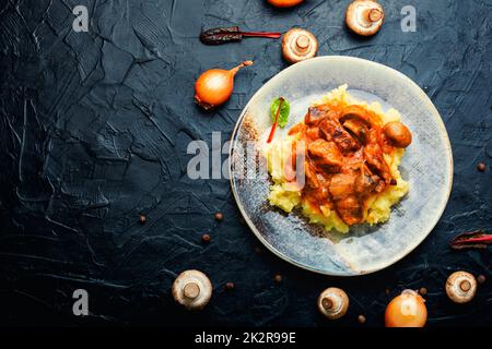 Meat with mushrooms, Beef stroganoff. Stock Photo