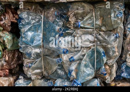 Plastic bottles in bales for waste recycling Stock Photo