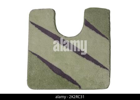 Close up of non slip green brown fluffy soft bath mat or rug isolated on white background. Bath accessories. Top view. Stock Photo