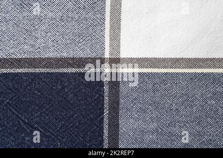 Texture, background and close-up of cotton fabric, with a check pattern Stock Photo