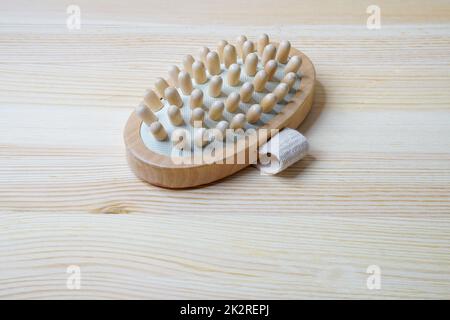 Still life and close-up of a wooden measuring brush Stock Photo