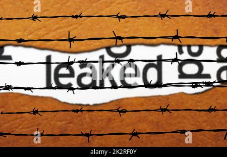 Leaked info and barbwire Stock Photo - Alamy