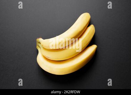 Bunch of bananas isolated on black background Stock Photo