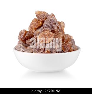 Raw of brown sugar cubes isolated on white background Stock Photo