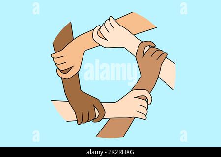 Multiracial people join hands in circle Stock Photo