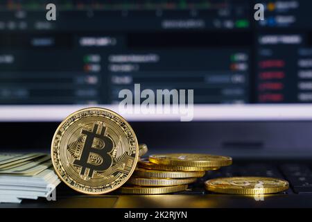 Bitcoins coins and banknotes on keyboard compute Stock Photo
