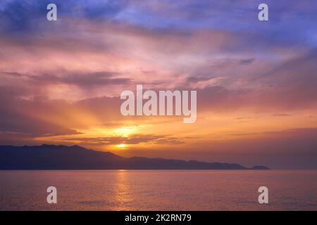 Sea sunset with dramatic sky Stock Photo
