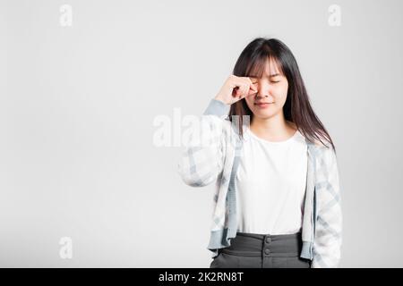 Unhappy woman bad mood her cry wipe tears with fingers Stock Photo