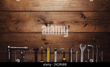 DYI composition of various work tools on wooden background flat lay Stock Photo