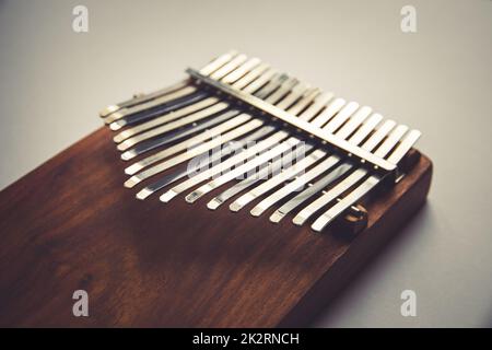 Traditional wooden kalimba isolated on white Stock Photo