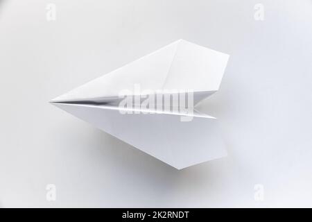 Paper plane origami isolated on a white background Stock Photo