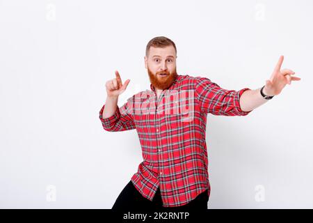 man with red hair and beard in plaid shirt Stock Photo