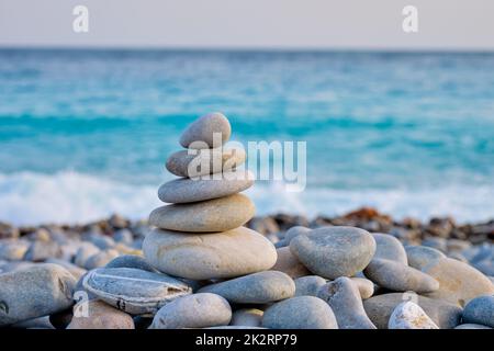 Zen balanced stones stack on beach Stock Photo