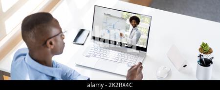 Man Participating In Online Coaching Session Stock Photo