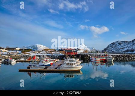 Fishing boats and yachts on pier in Norway Stock Photo