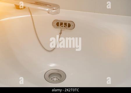 Hygienic wash basin with running clean water from tap faucet Stock Photo