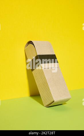Rectangular brown corrugated box for packing goods, perfumes, creams Stock Photo