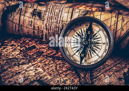 Old vintage compass on ancient map Stock Photo