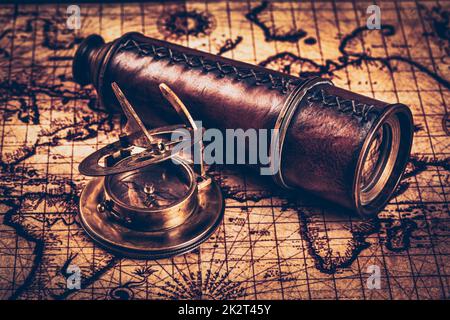 Old vintage compass on ancient map Stock Photo