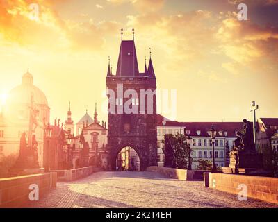 Charles bridge tower in Prague on sunrise Stock Photo