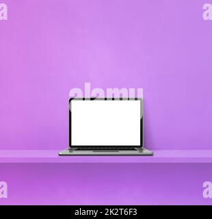 Laptop computer on purple shelf. Square background Stock Photo