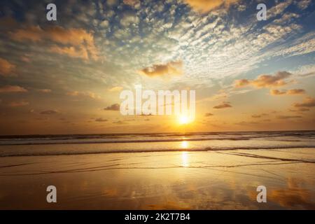 Sunset on Baga beach. Goa Stock Photo