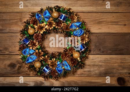 Christmas wreath on wooden background Stock Photo