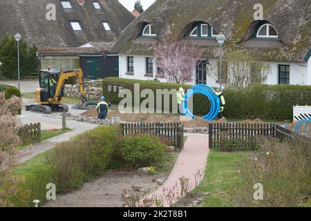 fiber laying for high speed internet construction site Stock Photo