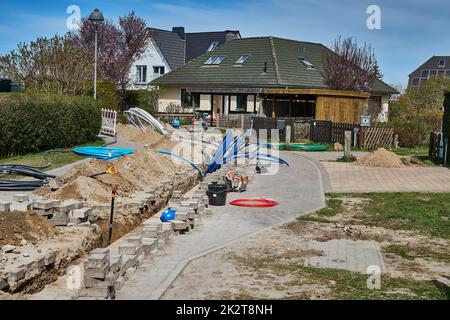 fiber laying for high speed internet construction site Stock Photo