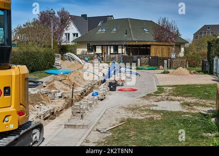 fiber laying for high speed internet construction site Stock Photo