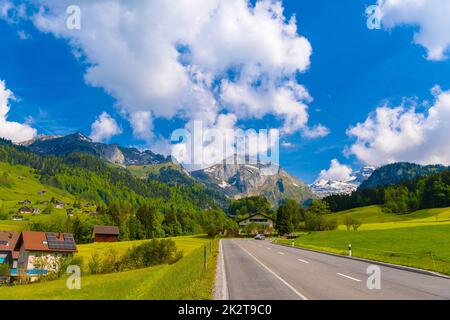 Countryside road in village, Alt Sankt Johann, Sankt Gallen, Swi Stock Photo