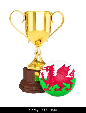 Gold trophy cup and soccer football ball with Wales flag Stock Photo