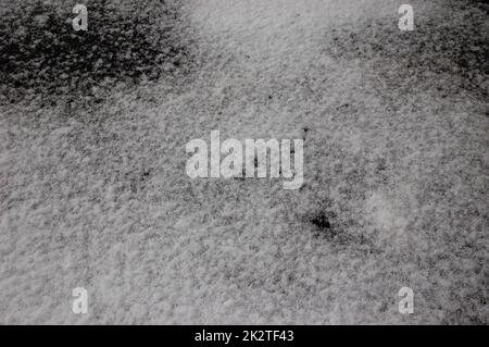Winter background: black ground covered with white snow Stock Photo - Alamy