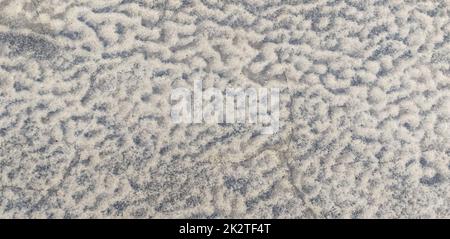 abstract winter background: frost patterns on the ground Stock Photo