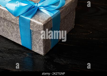 Gift box with red ribbon Stock Photo