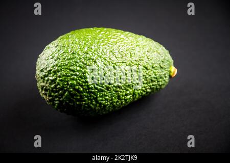 Avocado isolated on a black background Stock Photo