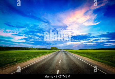 Road and stormy sky Stock Photo